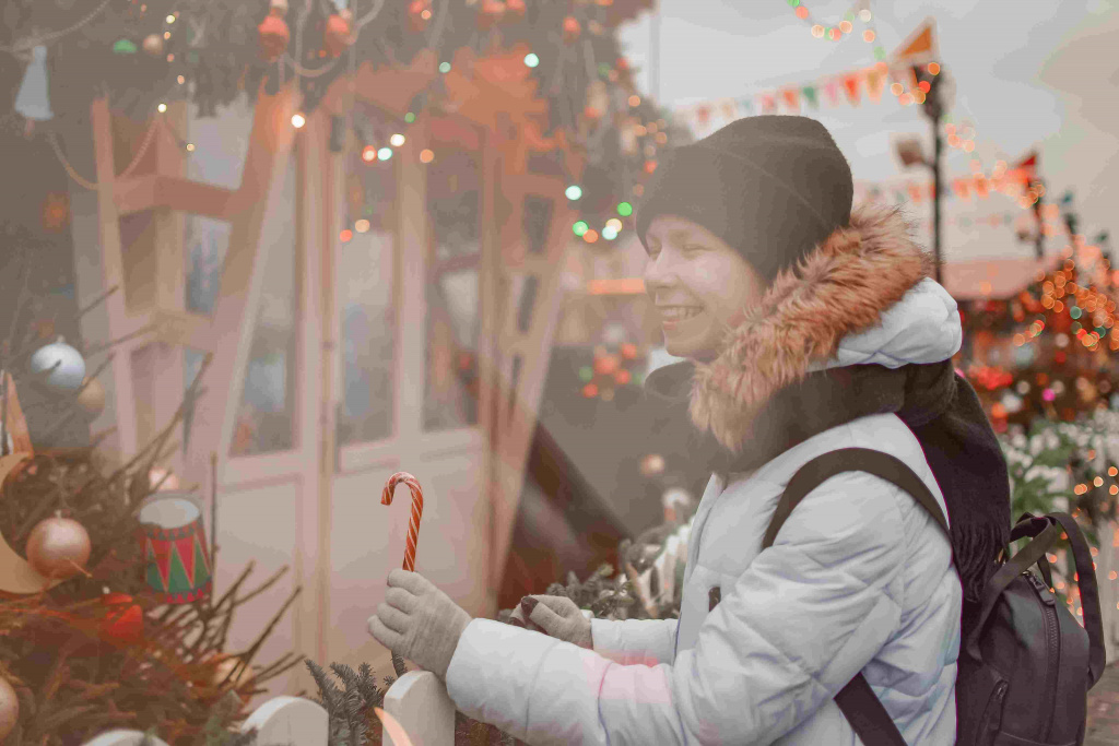 young-happy-woman-at-the-christmas-market-smiling-2024-12-05-13-32-42-utc (1).jpg